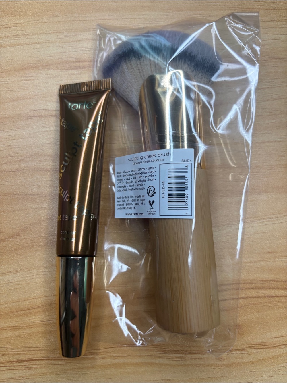 Tarte light cool bronze sculpt tape and cheek brush